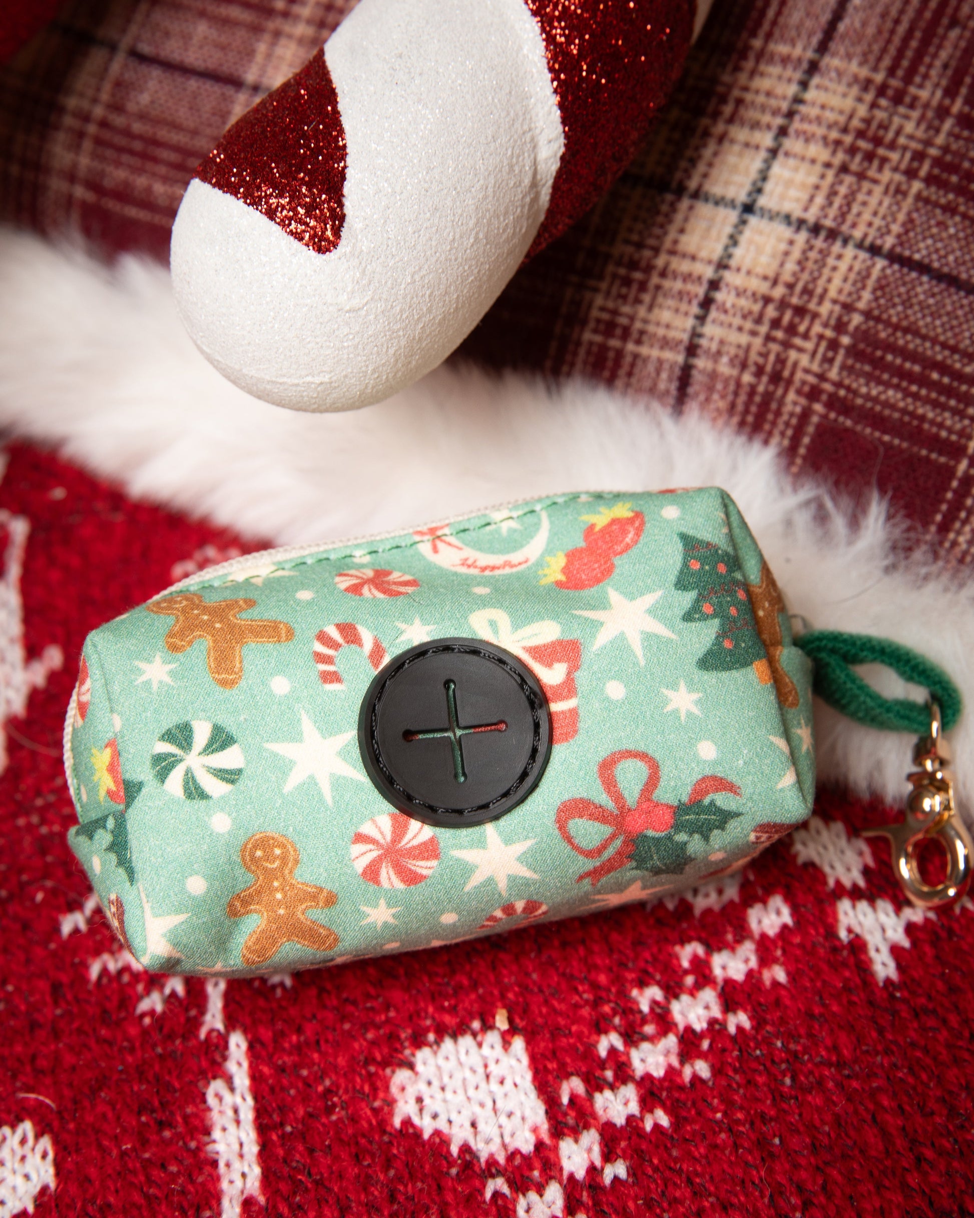 Small bag with Christmas pattern on a red textured surface