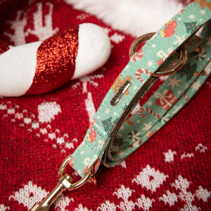 Dog leash with festive pattern on a red fabric background